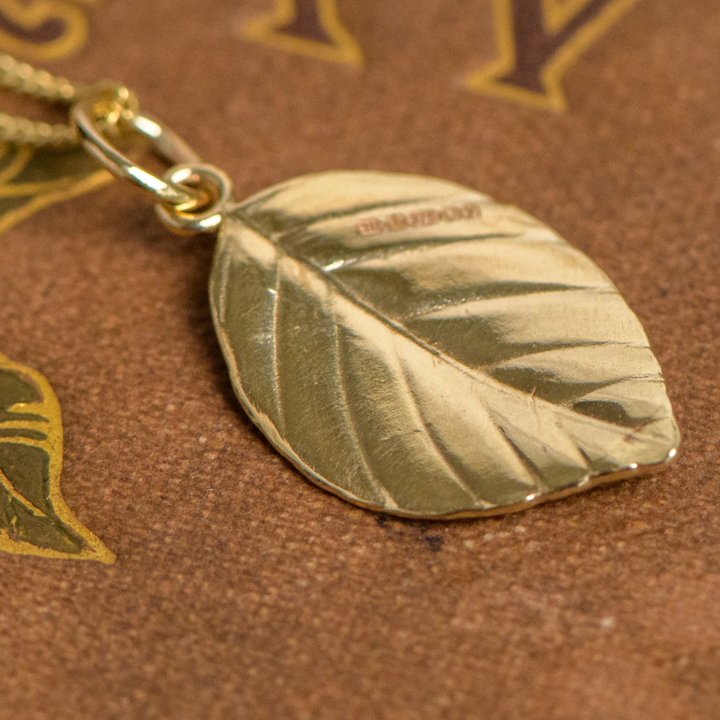 Leaf pendant cast from a beech tree in 9ct yellow gold