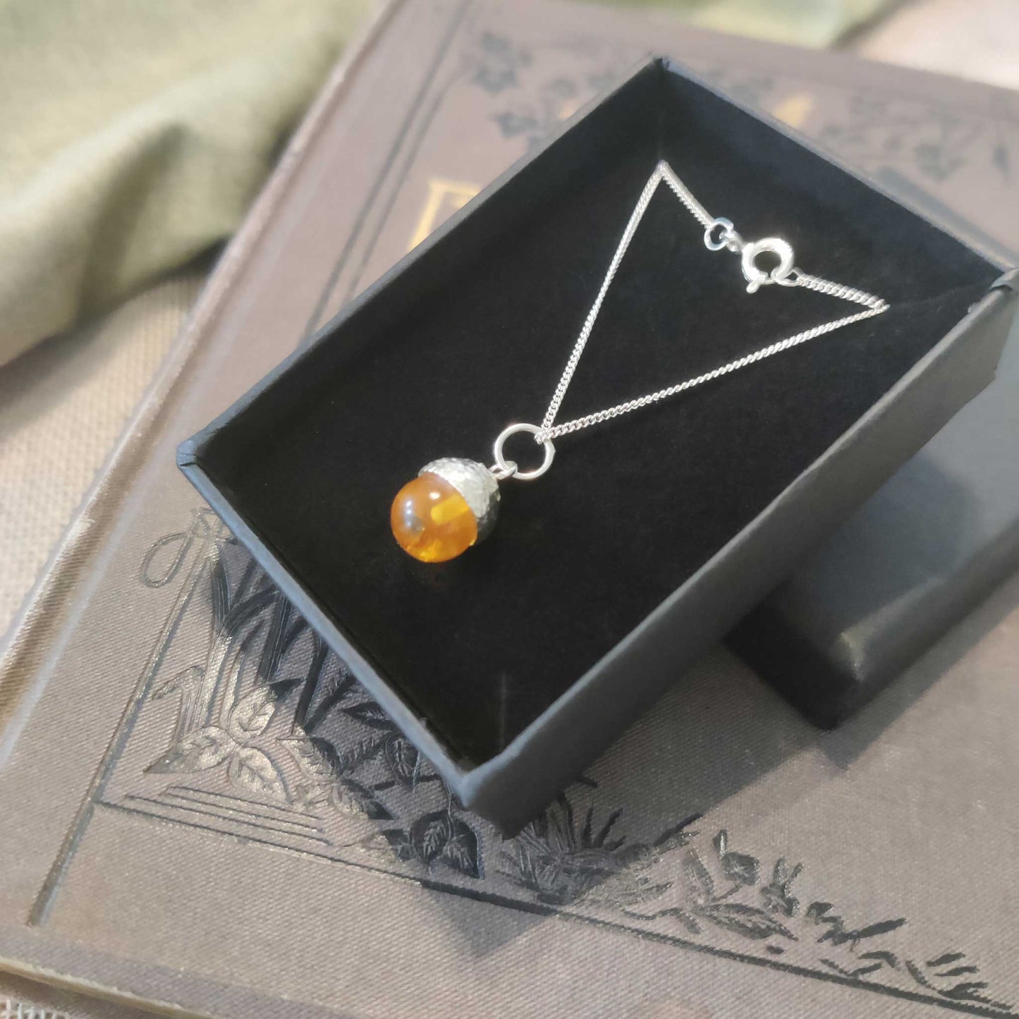 Amber acorn necklace by Notion Jewllery.