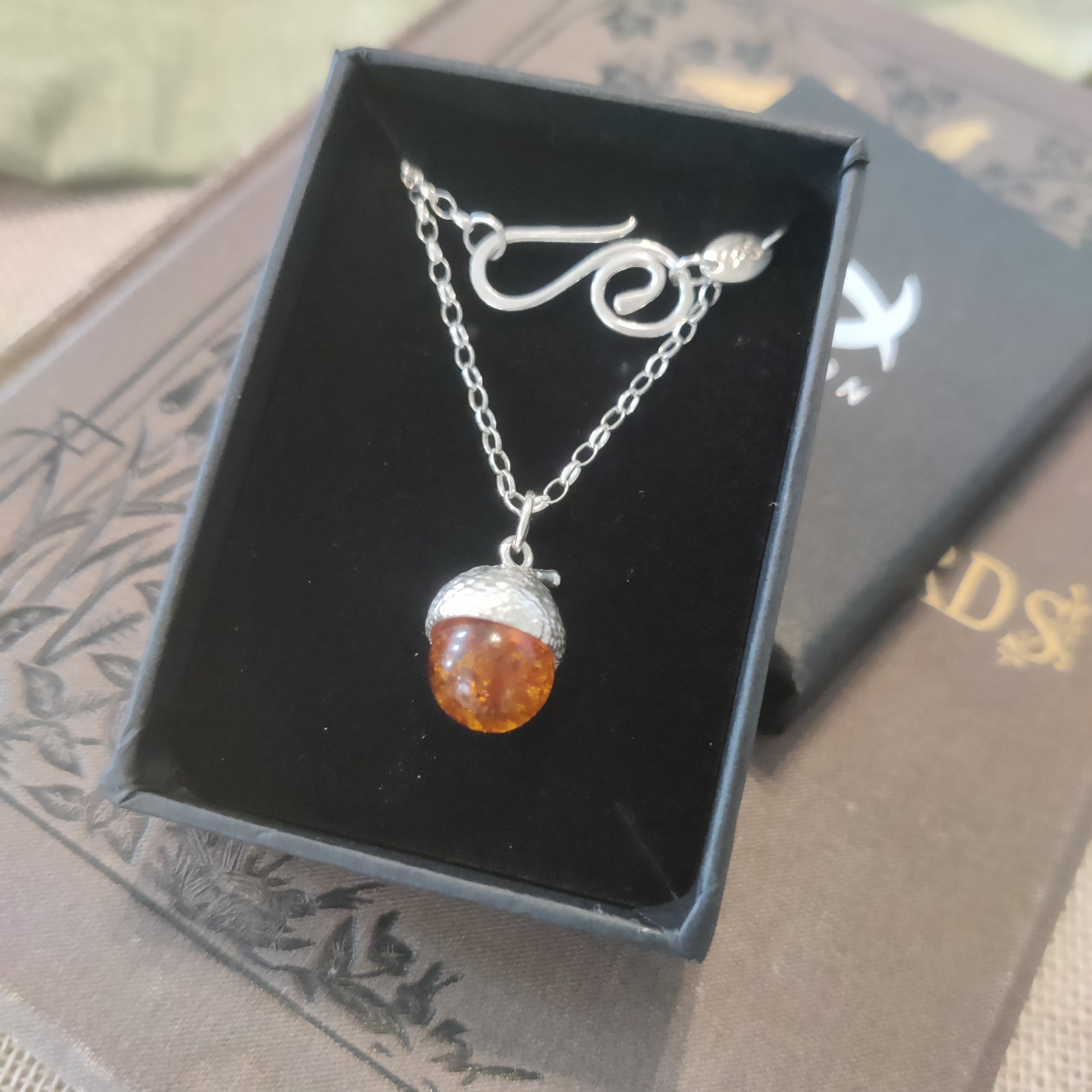 Large acorn and amber necklace in a gift box. 