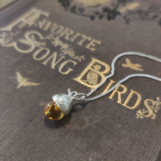 Delicate amber silver pendant by Notion Jewellery.