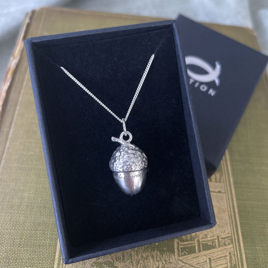"Great oaks from little acorns grow" engraved large silver acorn necklace by Notion Jewellery in a box