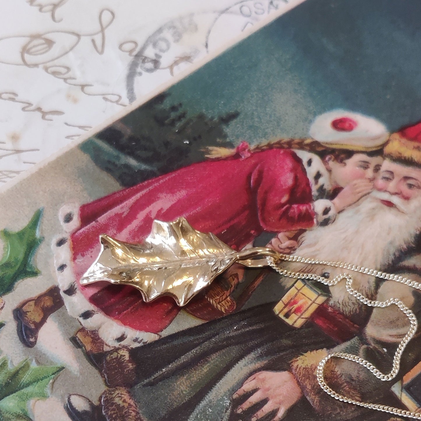 Leaf pendant handpicked from a holly tree an cast in yellow gold