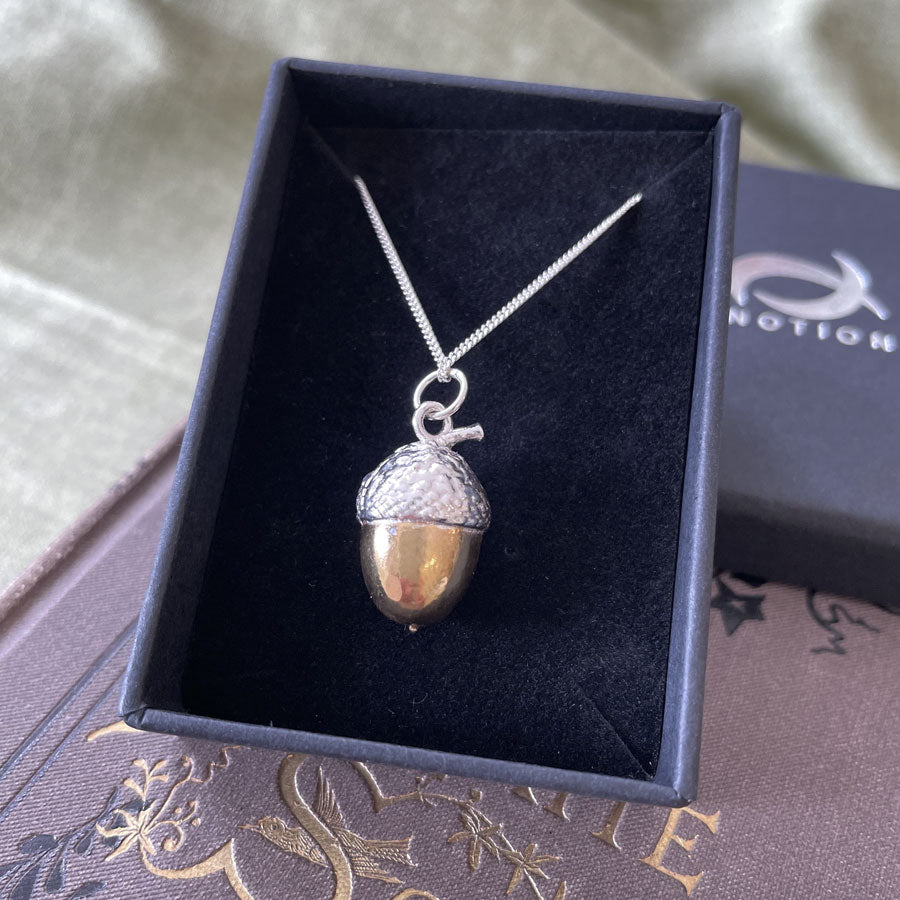 Large silver acorn with 18ct gold vermeil nut in box