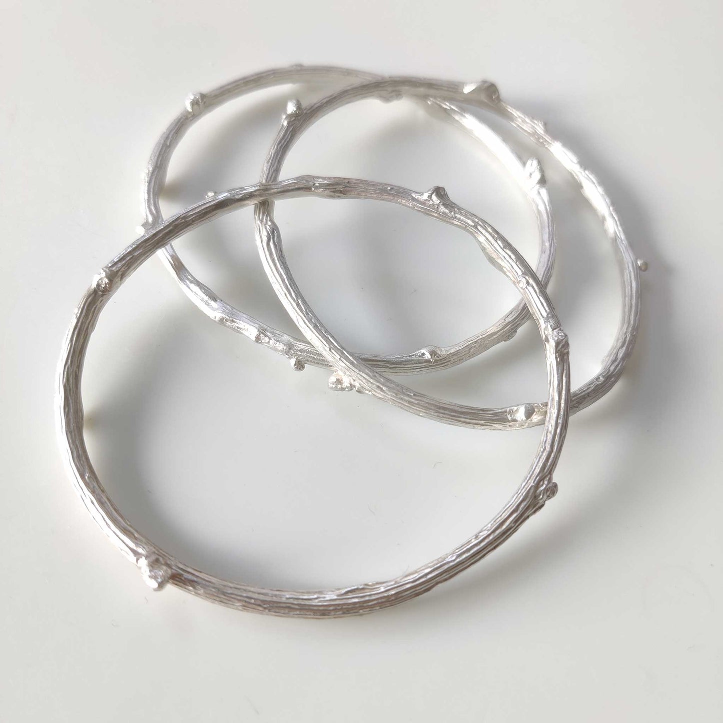 Chunky sterling silver twig bangles
