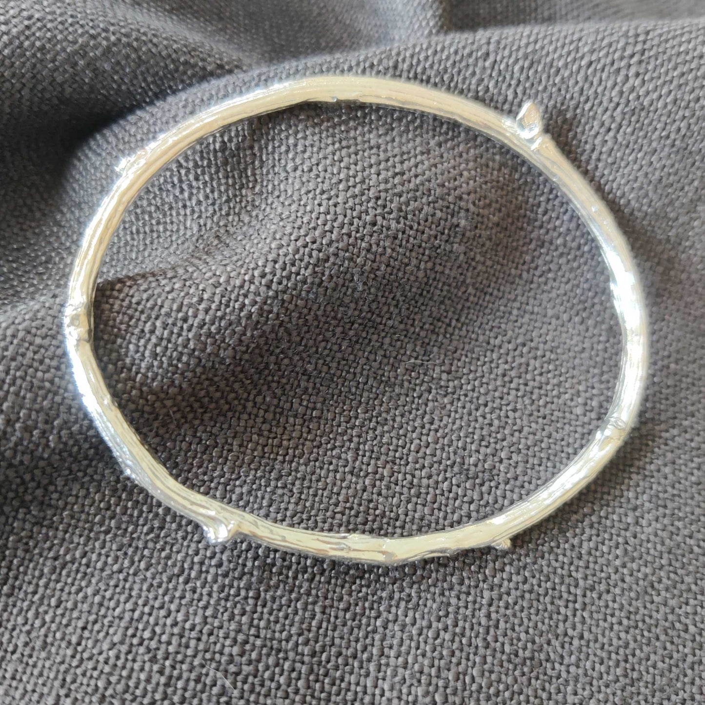 Sterling silver bangles. Woodland inspired jewellery.