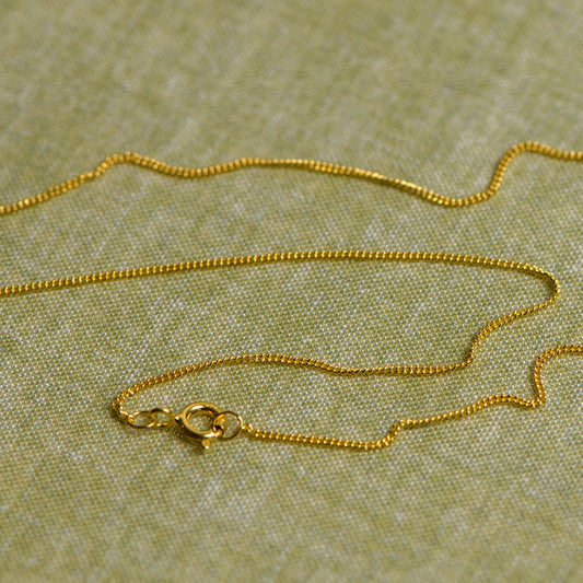 18ct gold curb chain by Notion Jewellery