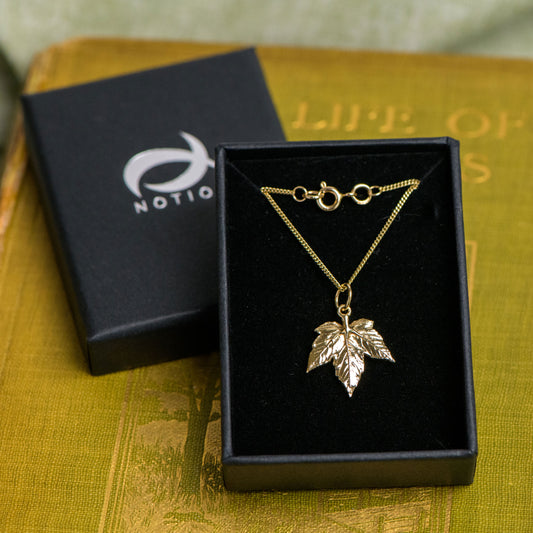 9ct gold sycamore leaf pendant by Notional Jewellery. Woodland inspired jewellery by Caroline.