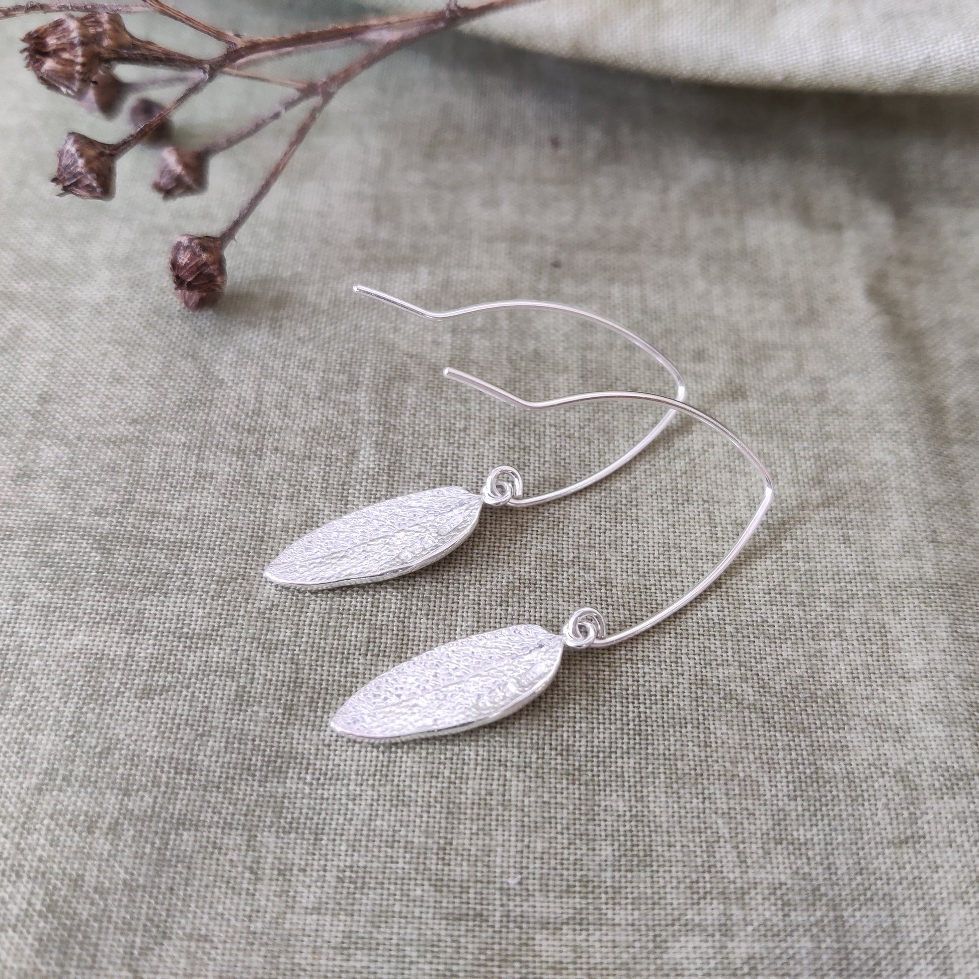 leaf earrings in silver by Notion Jewellery