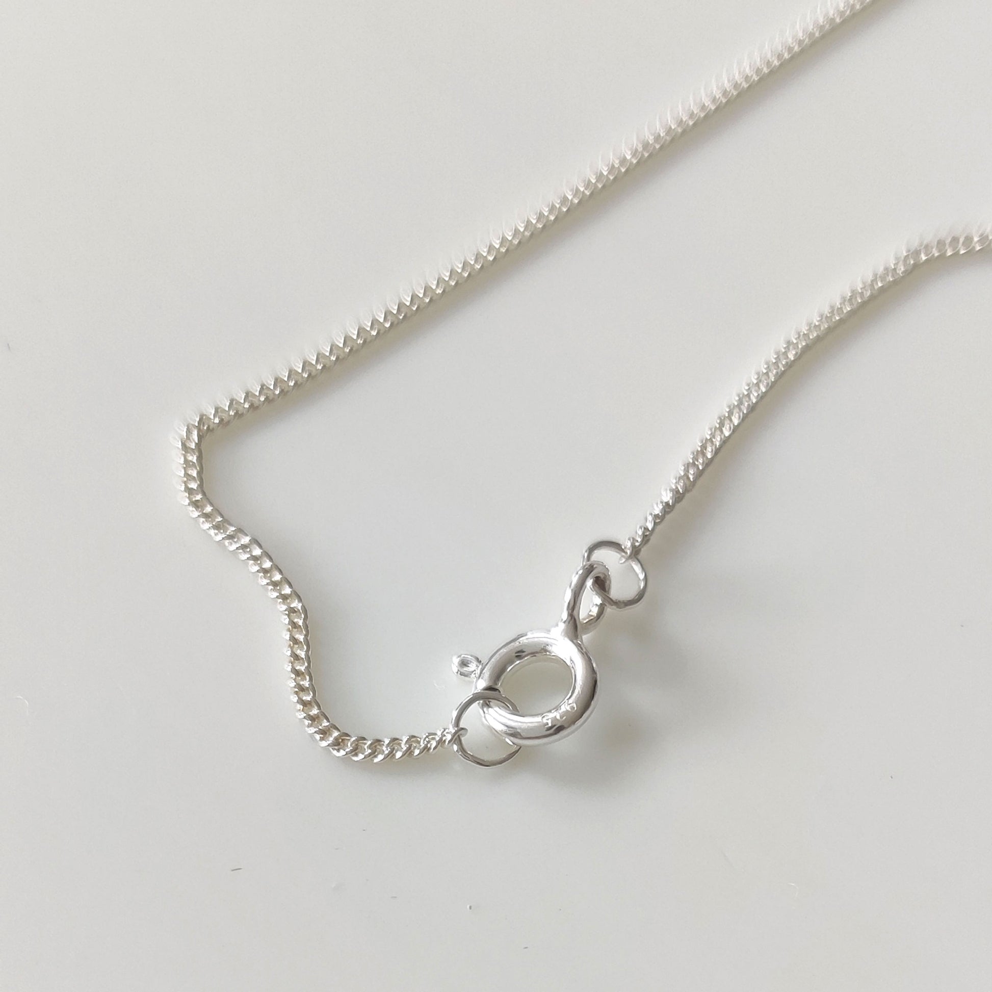 Silver curb chain by Notion Jewellery. 