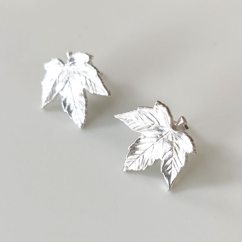 Small eco silver Sycamore leaf stud earrings - front