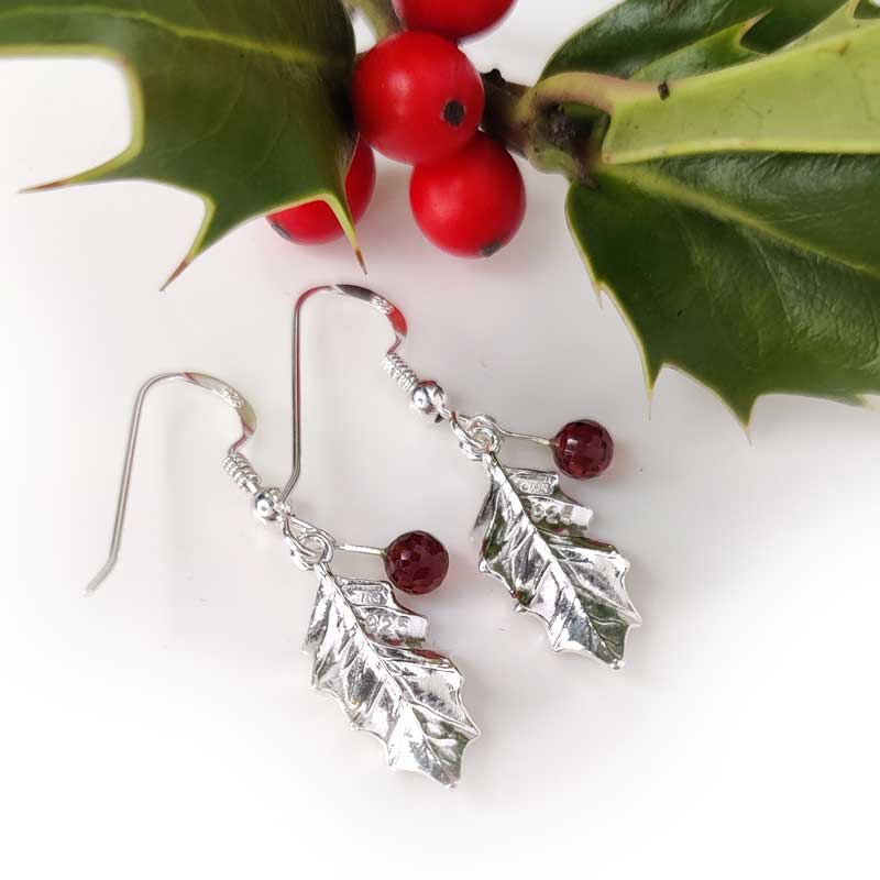 Silver holly drop earrings with garnets - back