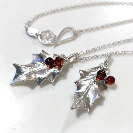 Medium silver holly leaves with Mozambique garnets
